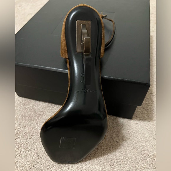 Brand new Yves Saint Laurent brown high heels. YSL is the heel on these shoes. - Picture 4 of 8